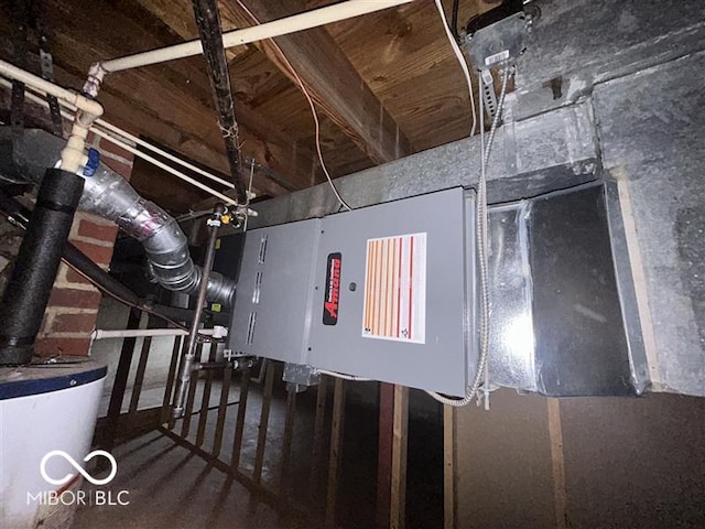 1640 Lawton Ave, Columbus, IN 47201 - utility room featuring water heater and electric panel