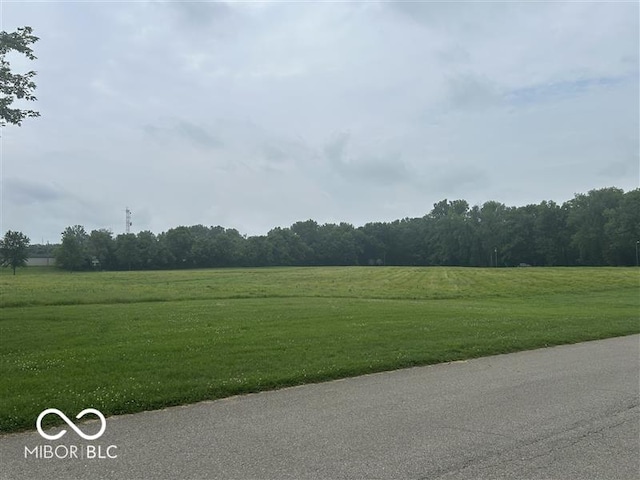 1640 Lawton Ave, Columbus, IN 47201 - view of asphalt road featuring a forest view and a rural view