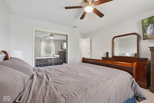 4464 Four Seasons Cir, Indianapolis, IN 46226 - bedroom with a ceiling fan, visible vents, and a closet