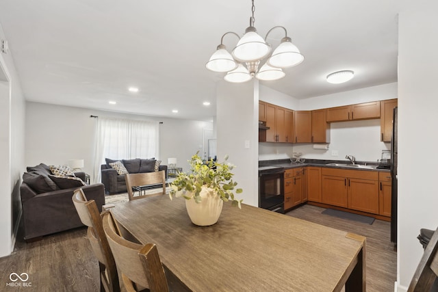 4464 Four Seasons Cir, Indianapolis, IN 46226 - dining space featuring a chandelier, dark wood-style flooring, and recessed lighting