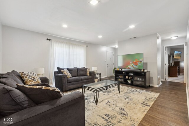 4464 Four Seasons Cir, Indianapolis, IN 46226 - living room with dark wood-type flooring, baseboards, and recessed lighting