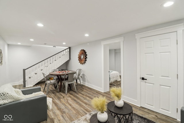 625 N Temple Ave, Indianapolis, IN 46201 - living room featuring stairway, wood finished floors, recessed lighting, and baseboards