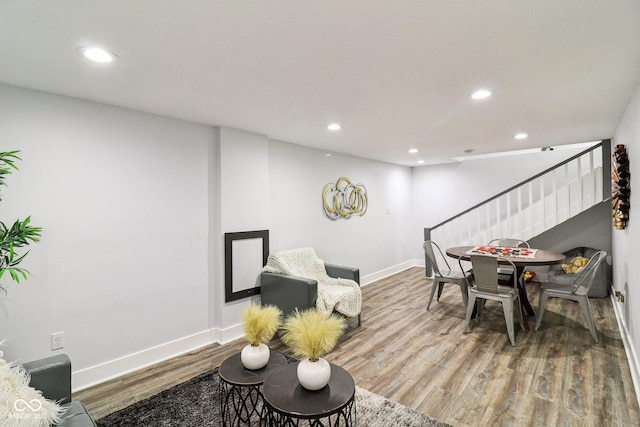 625 N Temple Ave, Indianapolis, IN 46201 - recreation room with wood finished floors, recessed lighting, and baseboards