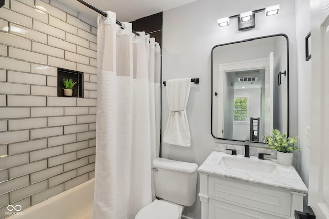 625 N Temple Ave, Indianapolis, IN 46201 - bathroom with vanity, toilet, and shower / bath combo with shower curtain