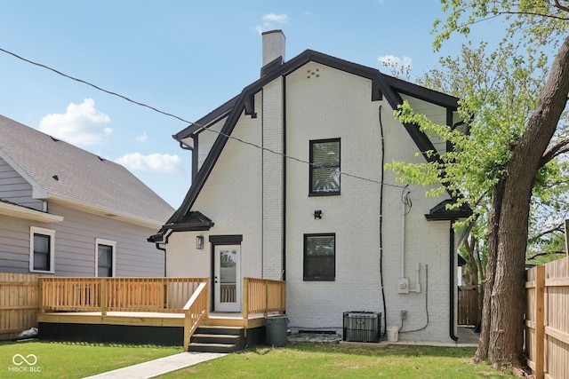 625 N Temple Ave, Indianapolis, IN 46201 - back of house featuring a deck, a chimney, brick siding, and central AC unit