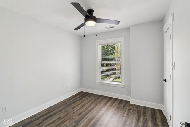 625 N Temple Ave, Indianapolis, IN 46201 - unfurnished room with dark wood finished floors, baseboards, and a ceiling fan