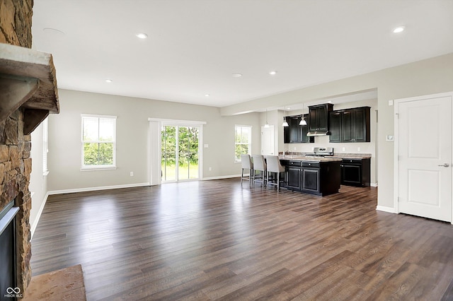 13567 Moorcroft Dr, Fishers, IN 46037 - unfurnished living room with a fireplace, dark wood-style flooring, recessed lighting, and baseboards