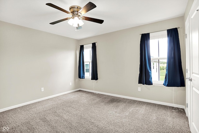 13567 Moorcroft Dr, Fishers, IN 46037 - spare room featuring carpet, plenty of natural light, and ceiling fan