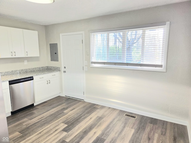 2465 N Eaton Ave, Indianapolis, IN 46219 - kitchen featuring stainless steel dishwasher, electric panel, white cabinets, wood finished floors, and light stone countertops