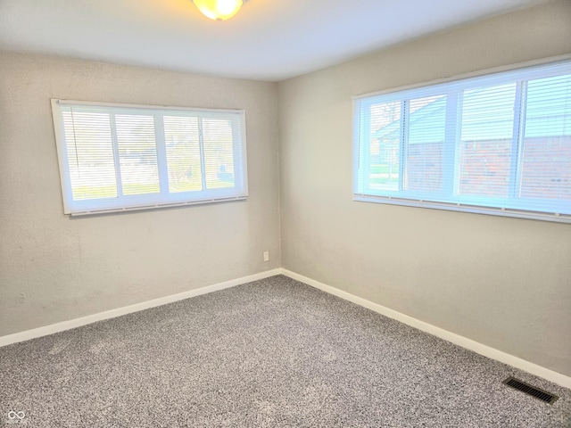 2465 N Eaton Ave, Indianapolis, IN 46219 - carpeted spare room with baseboards