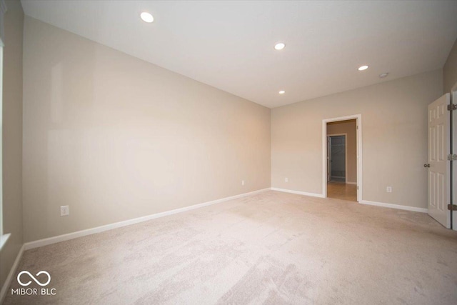 9455 Orchard Cove Dr, Indianapolis, IN 46239 - empty room with recessed lighting, baseboards, and light colored carpet