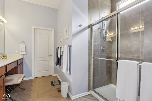 1361 Trescott Dr, Westfield, IN 46074 - bathroom with a shower stall, vanity, tile patterned floors, and baseboards