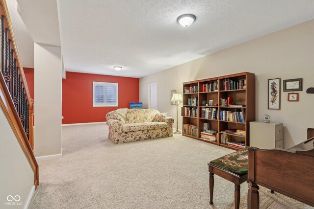 1361 Trescott Dr, Westfield, IN 46074 - living area featuring carpet, stairs, a textured ceiling, and baseboards