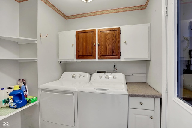 424 Orchard Blvd, Danville, IN 46122 - laundry area with washing machine and dryer, cabinet space, and crown molding