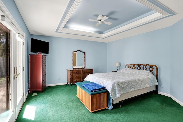 424 Orchard Blvd, Danville, IN 46122 - bedroom with a tray ceiling, carpet floors, a ceiling fan, and baseboards