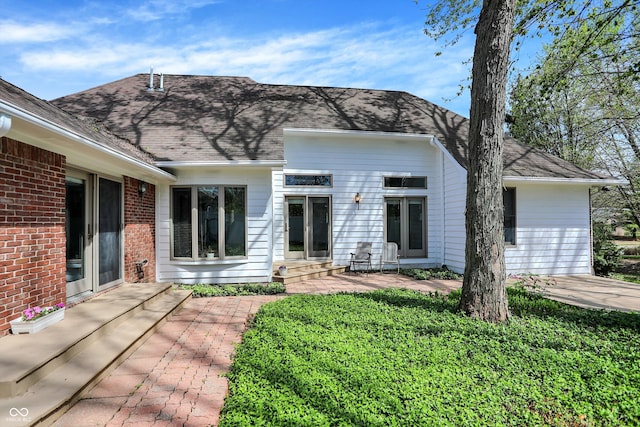 424 Orchard Blvd, Danville, IN 46122 - view of front of property featuring brick siding, a patio area, and a shingled roof