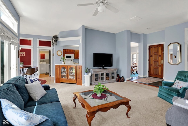 424 Orchard Blvd, Danville, IN 46122 - living room featuring a ceiling fan, carpet flooring, and washer / clothes dryer