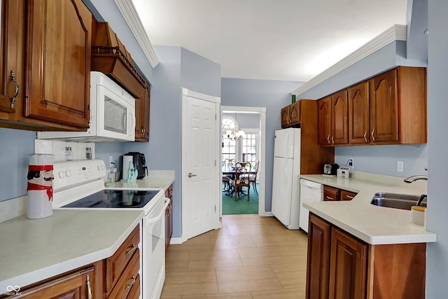 424 Orchard Blvd, Danville, IN 46122 - kitchen with a sink, baseboards, white appliances, brown cabinetry, and light countertops