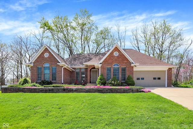 424 Orchard Blvd, Danville, IN 46122 - single story home with a garage, driveway, a shingled roof, a front yard, and brick siding