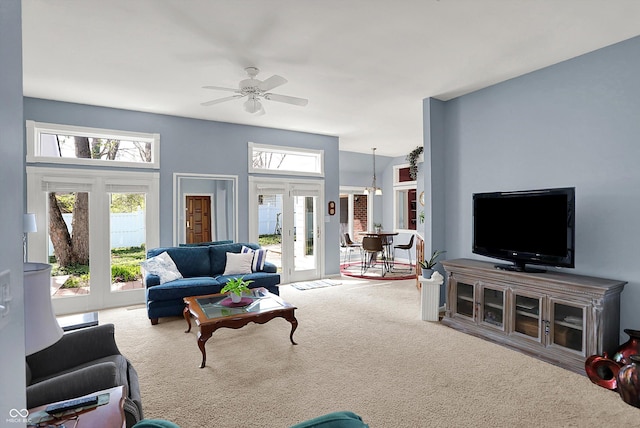 424 Orchard Blvd, Danville, IN 46122 - carpeted living area with a ceiling fan and french doors