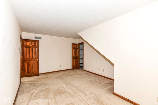 interior space featuring visible vents and baseboards