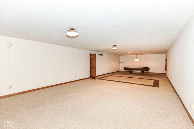 interior space with baseboards, light colored carpet, and pool table