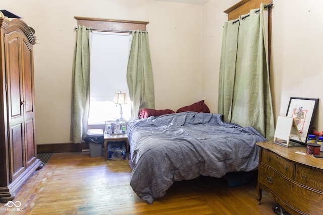 bedroom with light wood finished floors