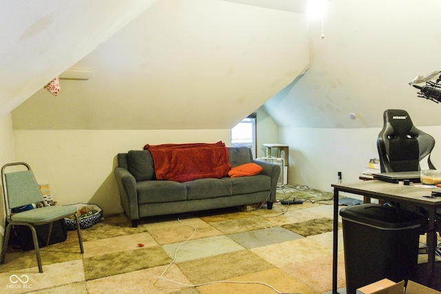 home office featuring lofted ceiling
