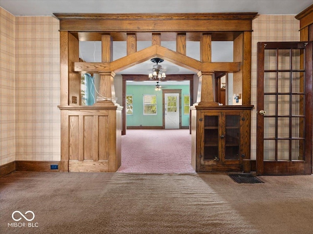 315 E N St, Greensburg, IN 47240 - unfurnished living room with carpet floors and wallpapered walls