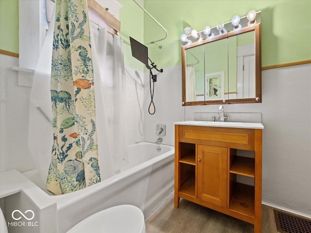 315 E N St, Greensburg, IN 47240 - bathroom with wood finished floors, vanity, and shower / bath combo