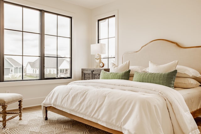 8082 Abington Way, Zionsville, IN 46077 - bedroom featuring baseboards and wood finished floors