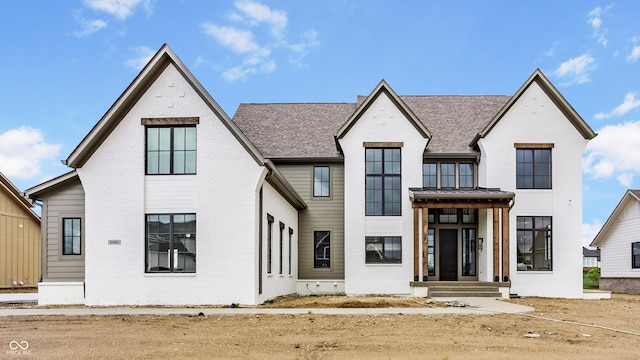 8082 Abington Way, Zionsville, IN 46077 - modern inspired farmhouse featuring brick siding and a shingled roof