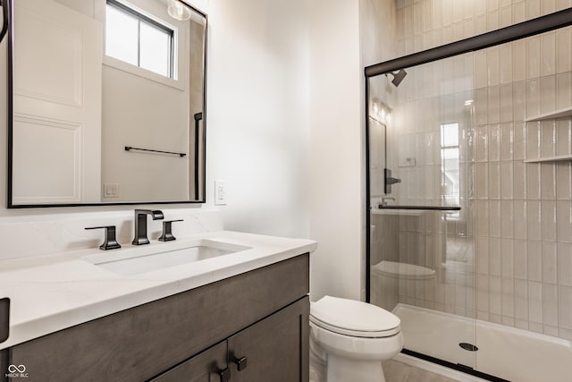 8082 Abington Way, Zionsville, IN 46077 - bathroom featuring toilet, vanity, and a stall shower