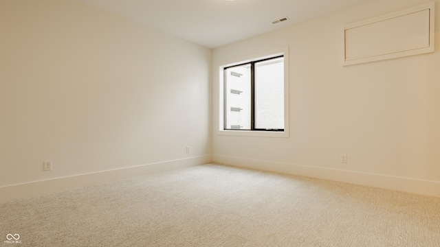 8082 Abington Way, Zionsville, IN 46077 - carpeted spare room with baseboards and visible vents