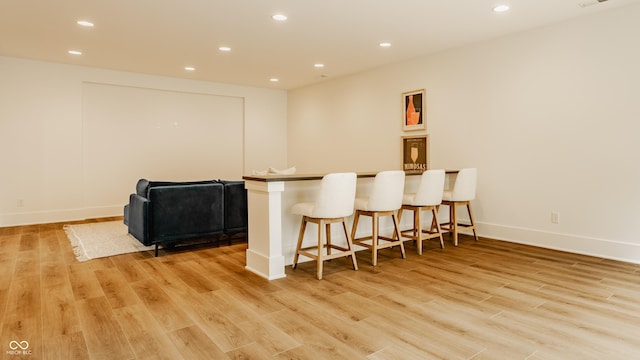 8082 Abington Way, Zionsville, IN 46077 - bar with a dry bar, light wood-style flooring, baseboards, and recessed lighting