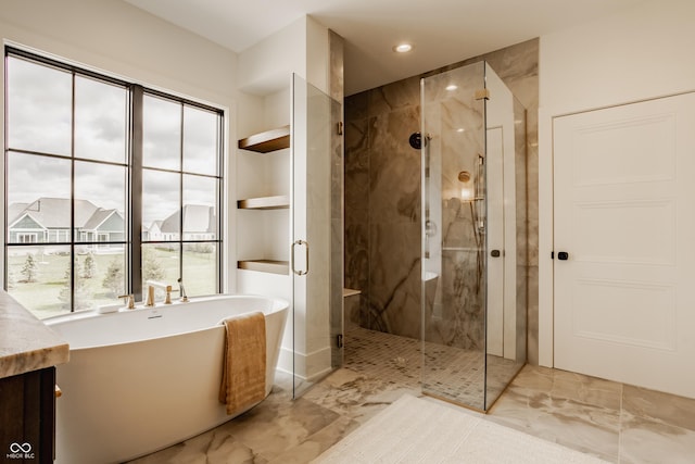 8082 Abington Way, Zionsville, IN 46077 - bathroom with recessed lighting, a soaking tub, marble finish floor, and a stall shower