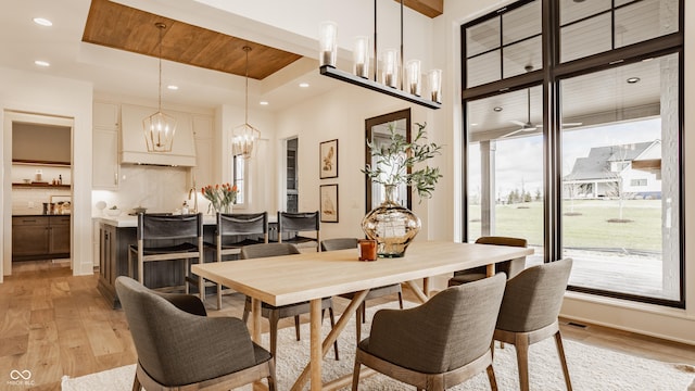 8082 Abington Way, Zionsville, IN 46077 - dining area featuring recessed lighting, a notable chandelier, and light wood-type flooring