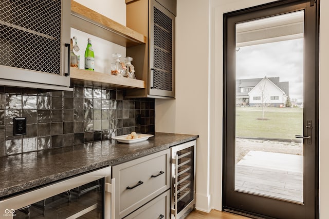 8082 Abington Way, Zionsville, IN 46077 - bar with backsplash, a bar, and wine cooler