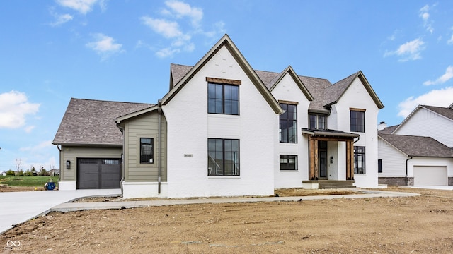 8082 Abington Way, Zionsville, IN 46077 - modern farmhouse style home with a garage, a shingled roof, and concrete driveway