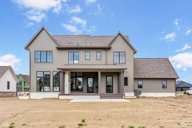 8082 Abington Way, Zionsville, IN 46077 - rear view of property featuring a chimney, central AC unit, and a shingled roof