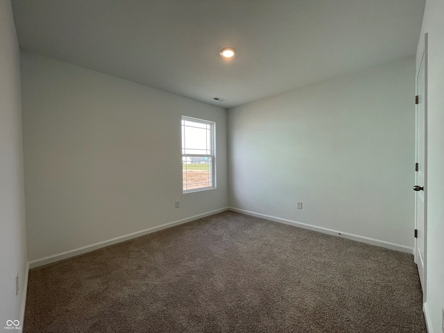 1319 Fleming Dr, Greenfield, IN 46140 - carpeted spare room with baseboards and recessed lighting