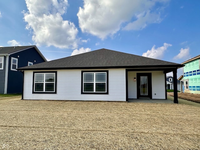 1319 Fleming Dr, Greenfield, IN 46140 - rear view of property with a patio and a shingled roof