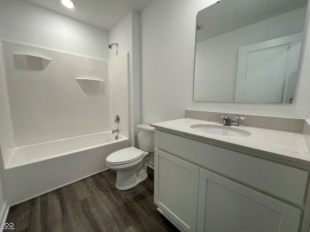1319 Fleming Dr, Greenfield, IN 46140 - bathroom featuring wood finished floors, vanity, and shower / tub combination