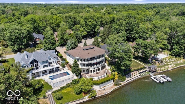 10919 Brigantine Dr, Indianapolis, IN 46256 - birds eye view of property featuring a wooded view and a water view