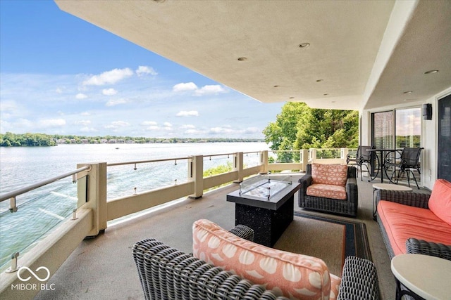 10919 Brigantine Dr, Indianapolis, IN 46256 - balcony featuring an outdoor living space with a fire pit and a water view