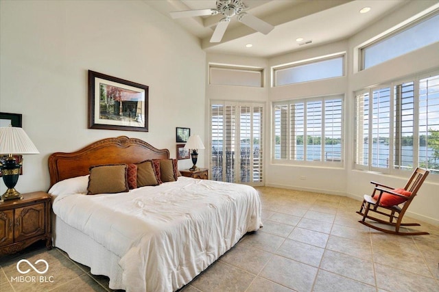 10919 Brigantine Dr, Indianapolis, IN 46256 - bedroom with recessed lighting, a high ceiling, a water view, light tile patterned floors, and baseboards