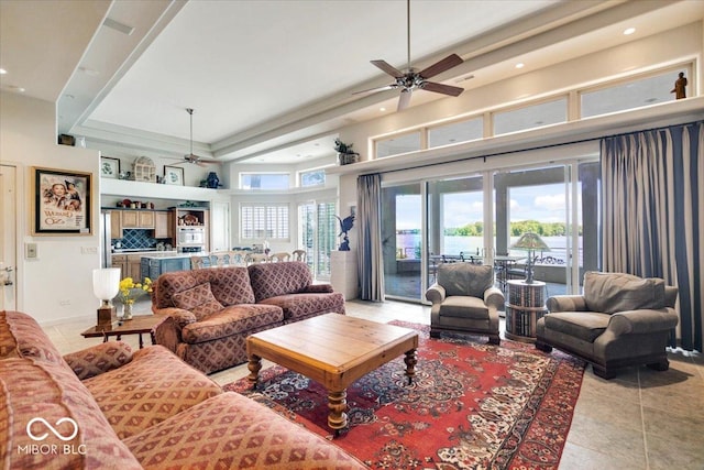 10919 Brigantine Dr, Indianapolis, IN 46256 - living area with recessed lighting, light tile patterned flooring, a towering ceiling, and ceiling fan