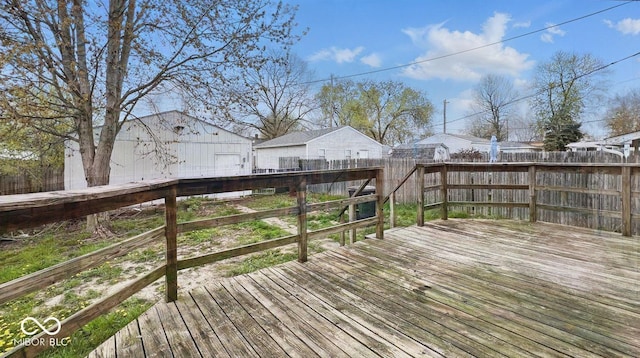 deck with a fenced backyard