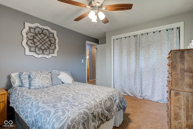 bedroom featuring a ceiling fan, carpet floors, and a closet