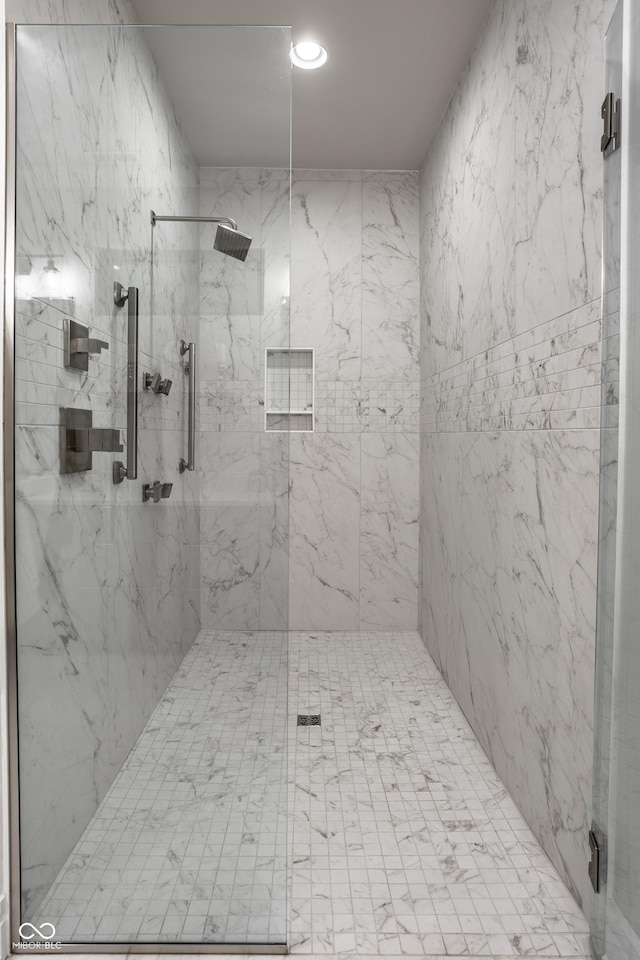 full bath with recessed lighting and a marble finish shower